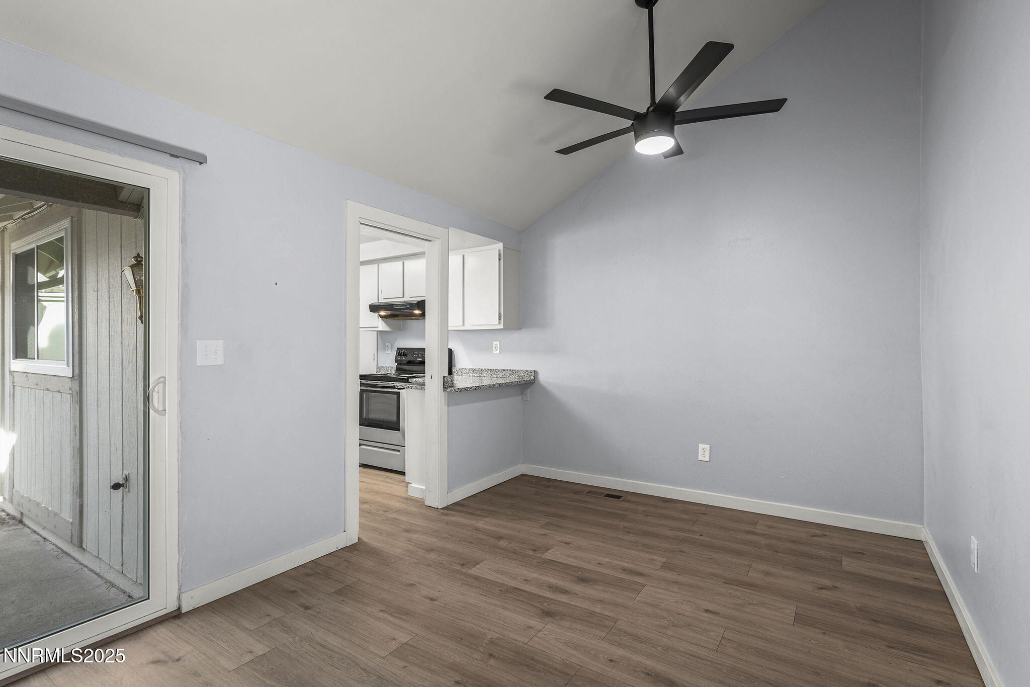 1149 Wagon Wheel Circle Reno, NV 89503 - Photo 7 of 19 a view of a kitchen with a sink and a refrigerator