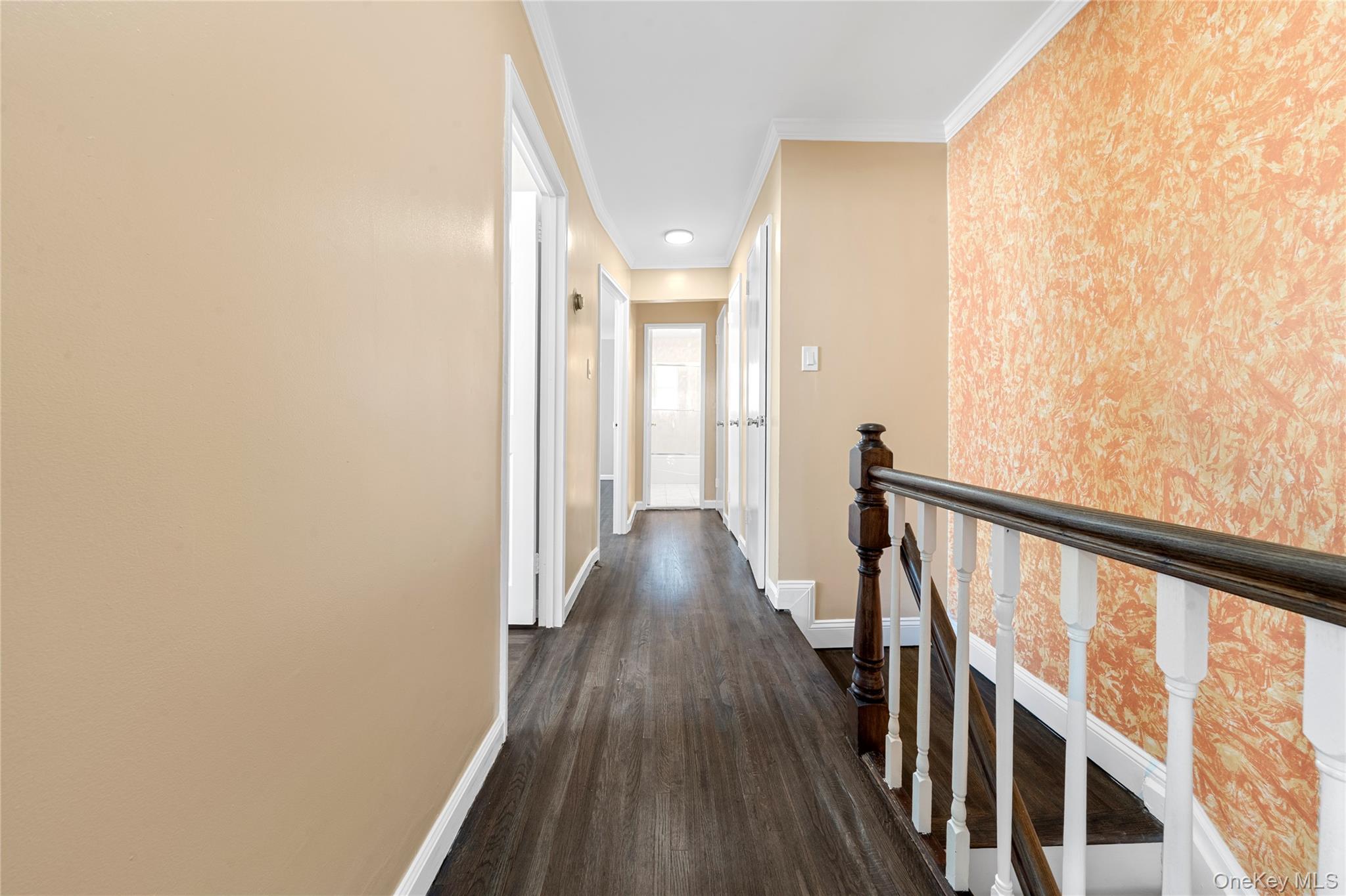 1331 Remsen Avenue Brooklyn, NY 11236 - Photo 14 of 30 a view of a hallway with wooden floor and staircase