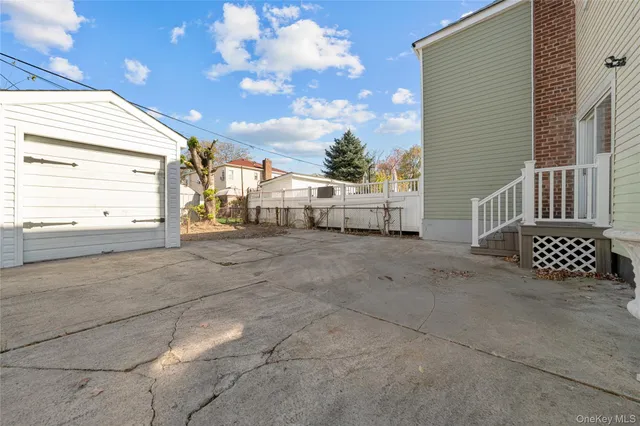 a view of a street with garage