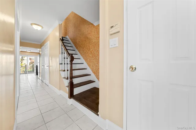 a view of a hallway with entryway