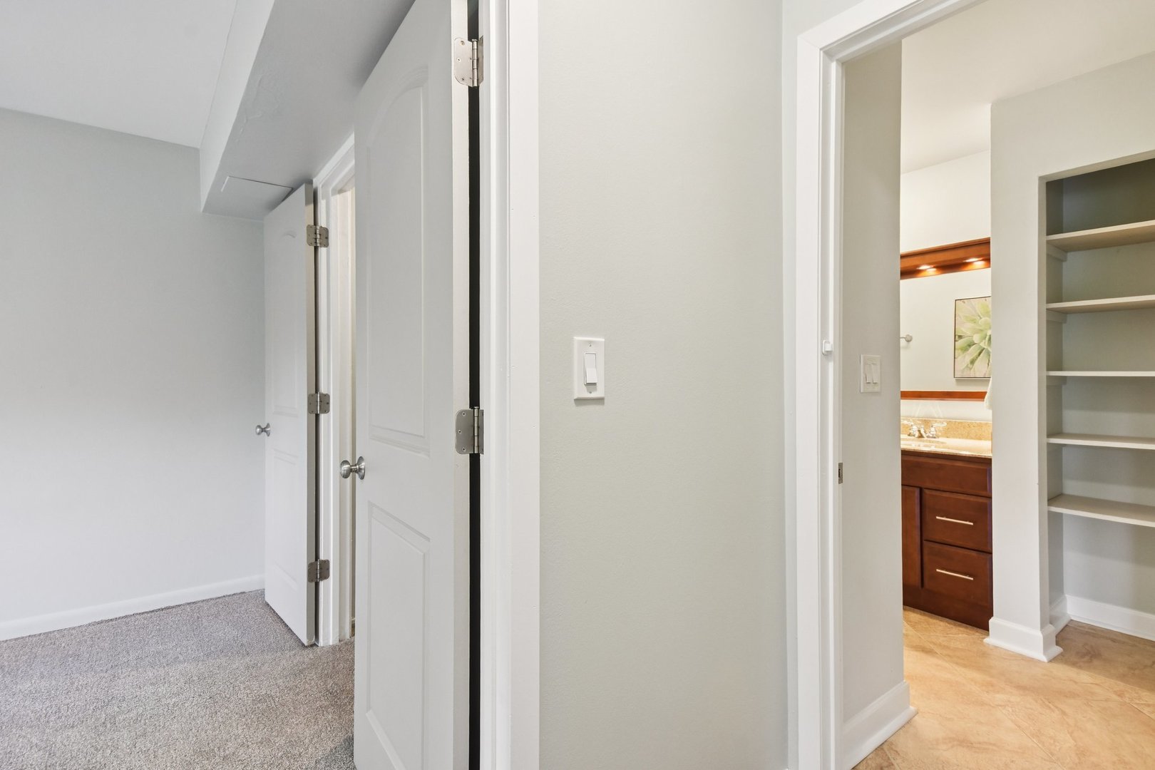493 McHenry Road, Unit 1B Wheeling, IL 60090 - Photo 13 of 30 a view of walk in closet with empty racks