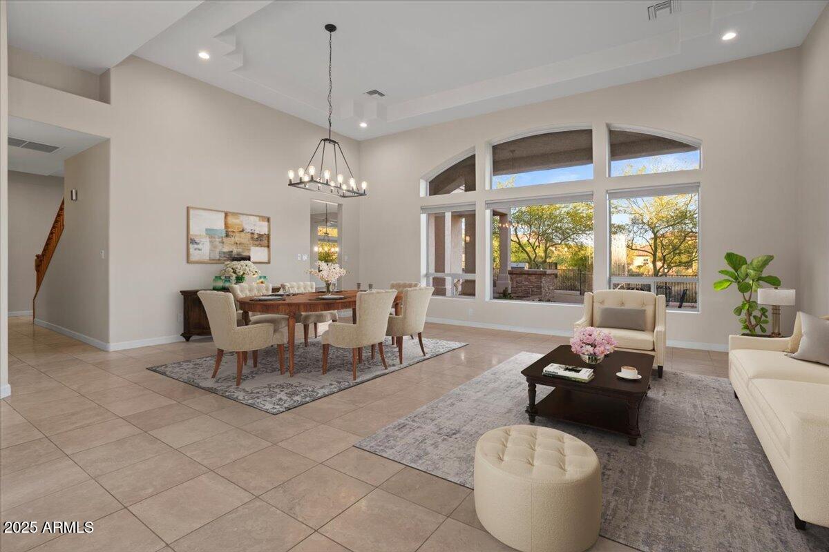 8540 East McDowell Road, Unit 119 Mesa, AZ 85207 - Photo 10 of 94 a living room with furniture and a large window