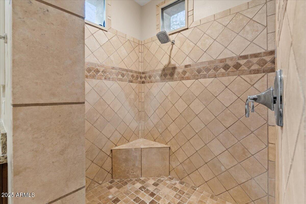 8540 East McDowell Road, Unit 119 Mesa, AZ 85207 - Photo 38 of 94 a bathroom with a shower