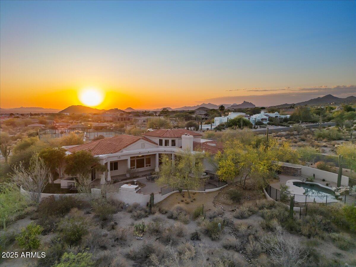 8540 East McDowell Road, Unit 119 Mesa, AZ 85207 - Photo 4 of 94 a view of a lake with mountains in the background