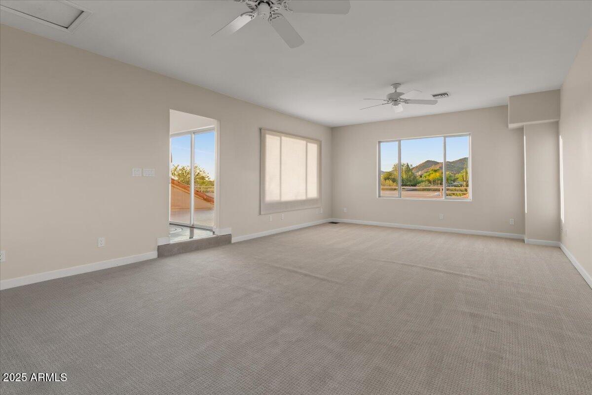 8540 East McDowell Road, Unit 119 Mesa, AZ 85207 - Photo 51 of 94 a view of an empty room with a window