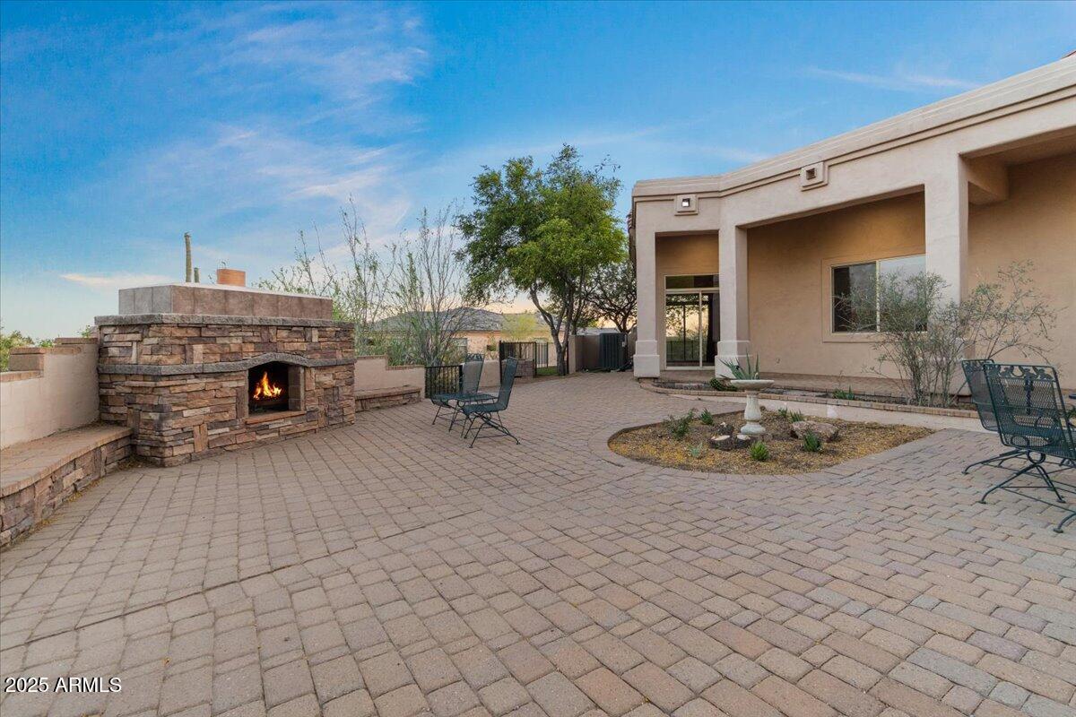 8540 East McDowell Road, Unit 119 Mesa, AZ 85207 - Photo 75 of 94 75-Fireplace