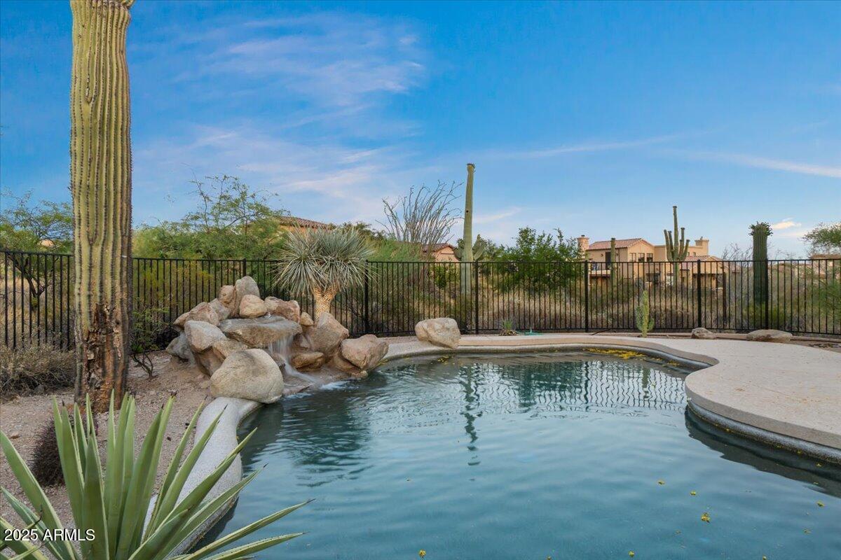 8540 East McDowell Road, Unit 119 Mesa, AZ 85207 - Photo 83 of 94 83-Pool and back of home