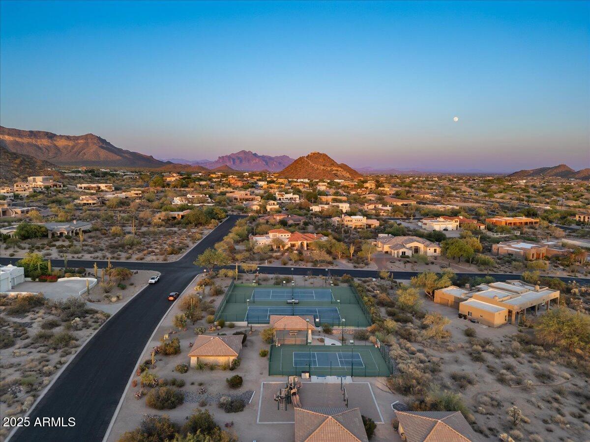 8540 East McDowell Road, Unit 119 Mesa, AZ 85207 - Photo 92 of 94 an aerial view of residential houses with outdoor space