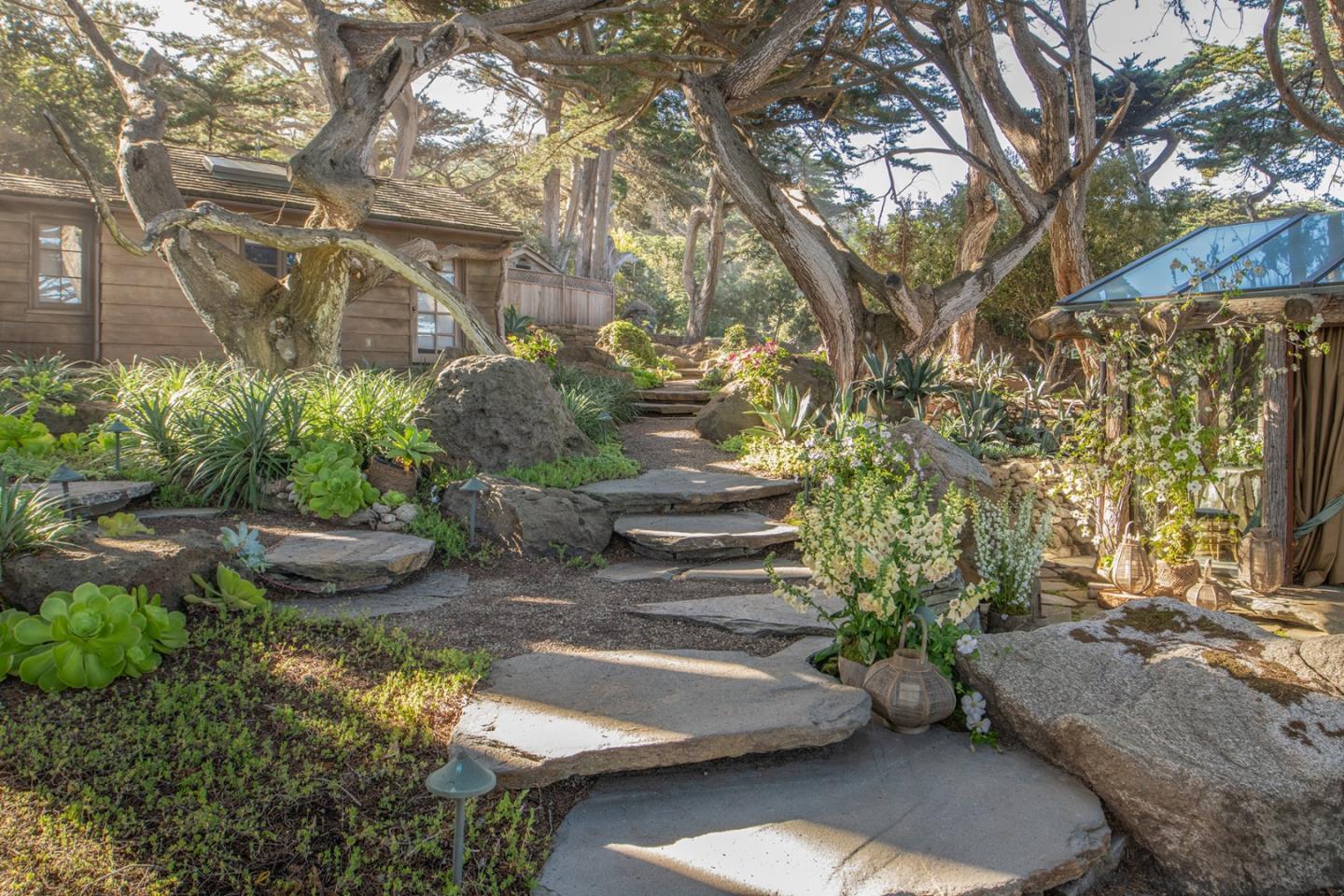 157-163 Spindrift Road Carmel, CA 93923 - Photo 86 of 100 a view of a yard with cars
