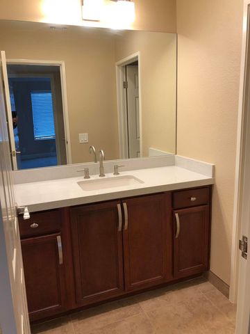 a bathroom with a toilet and a bathtub