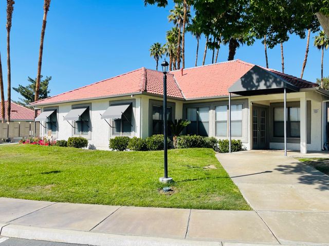 a view of a city with a lake