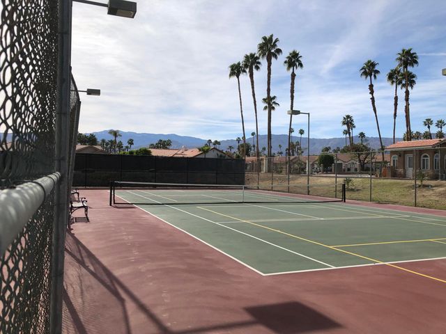 a sign on the side of the road