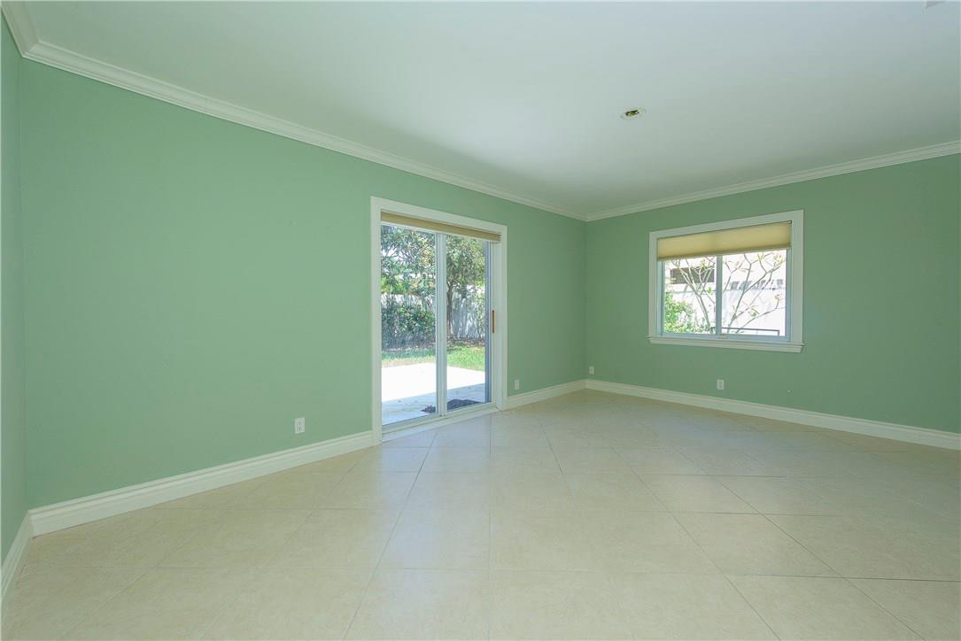 3405 Leigh Road Pompano Beach, FL 33062 - Photo 11 of 35 an empty room with a window