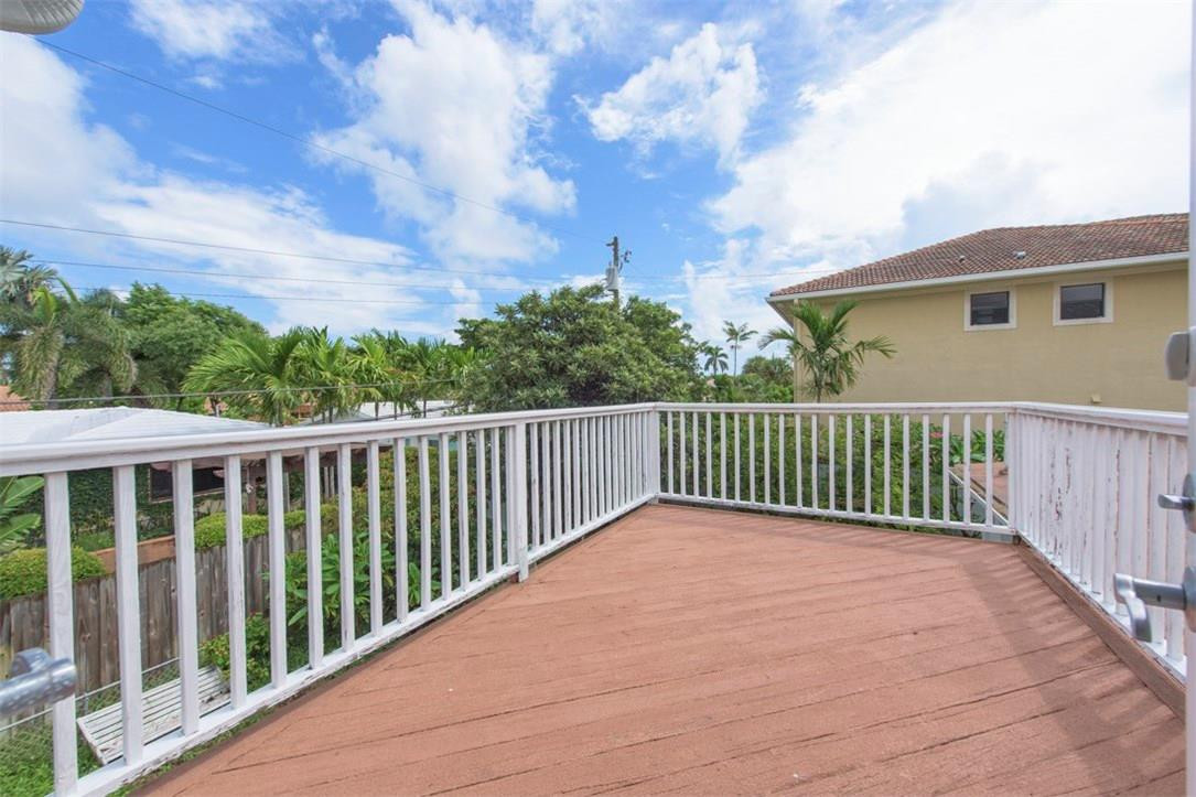 3405 Leigh Road Pompano Beach, FL 33062 - Photo 23 of 35 a view of a wooden fence