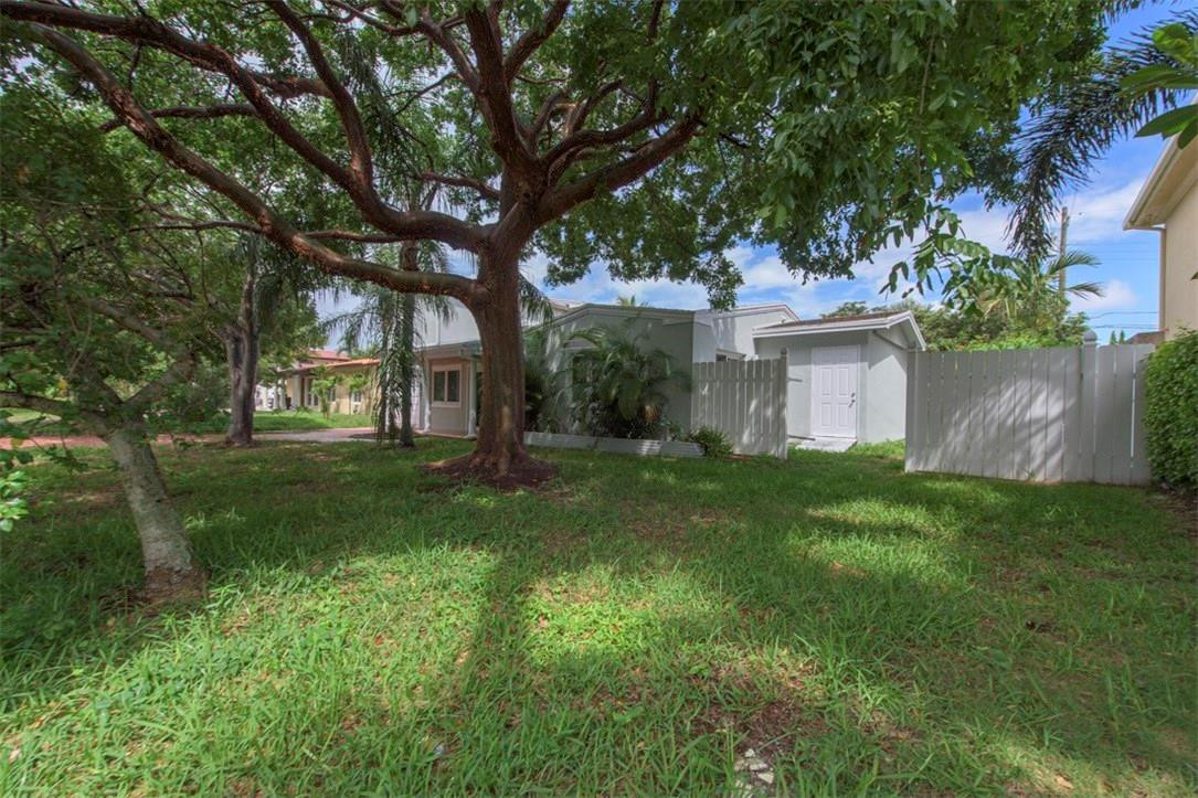 3405 Leigh Road Pompano Beach, FL 33062 - Photo 27 of 35 a view of a house with a yard