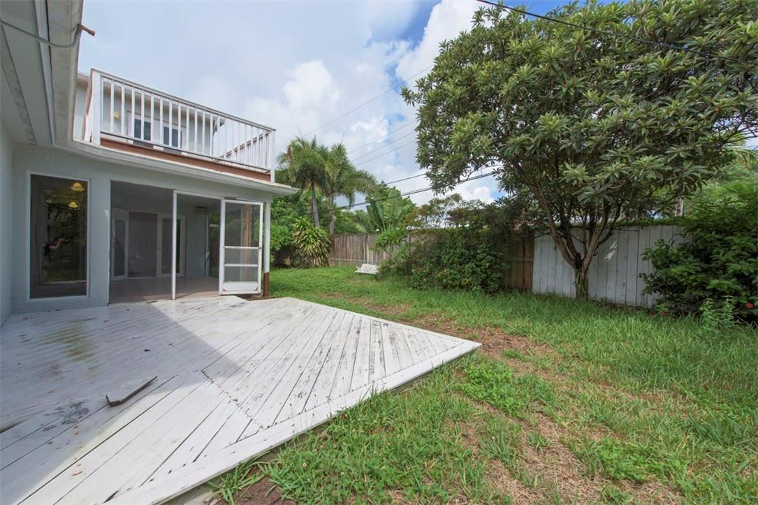 3405 Leigh Road Pompano Beach, FL 33062 - Photo 29 of 35 a view of a house with a yard