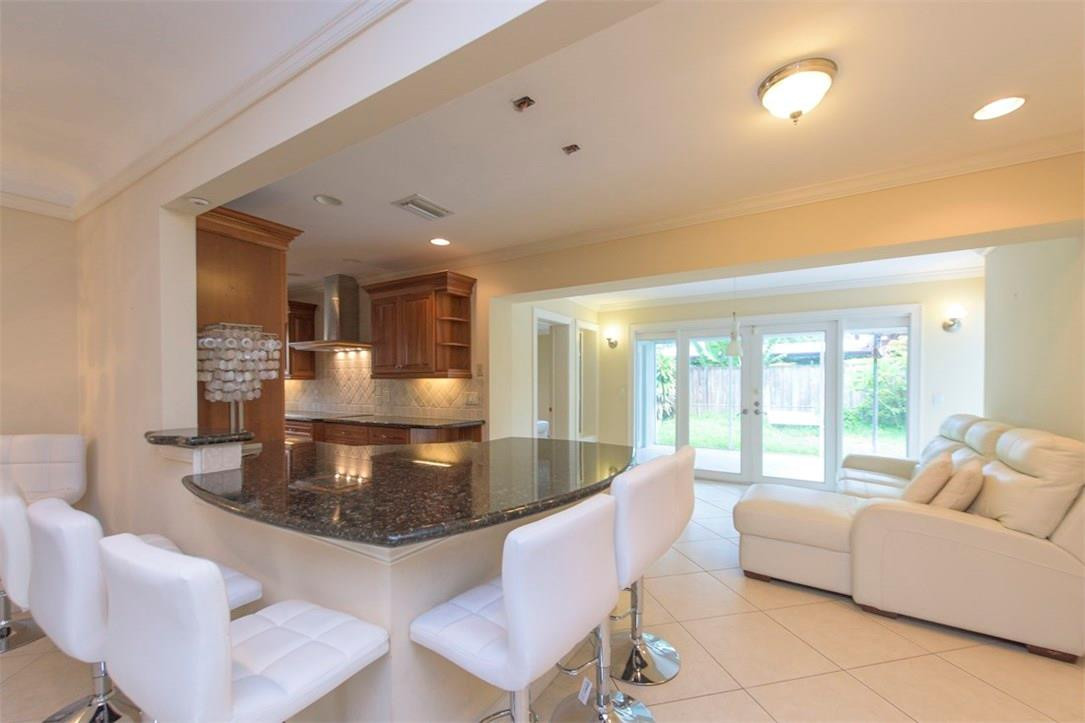 3405 Leigh Road Pompano Beach, FL 33062 - Photo 6 of 35 a living room with furniture and a large window