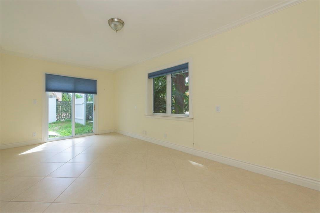 3405 Leigh Road Pompano Beach, FL 33062 - Photo 9 of 35 an empty room with windows