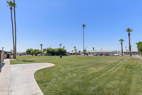 a view of a golf course with a park