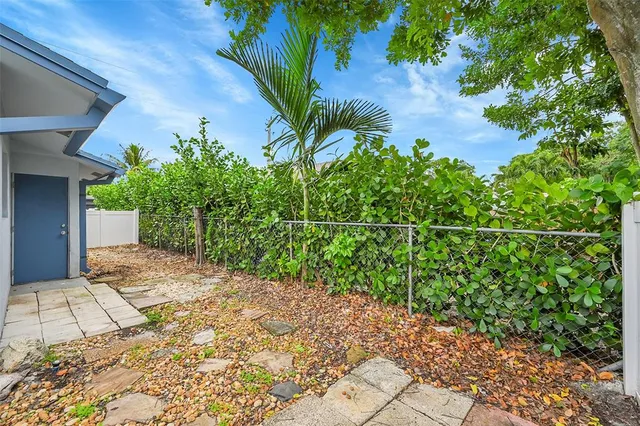 a kitchen with a refrigerator a sink and dishwasher