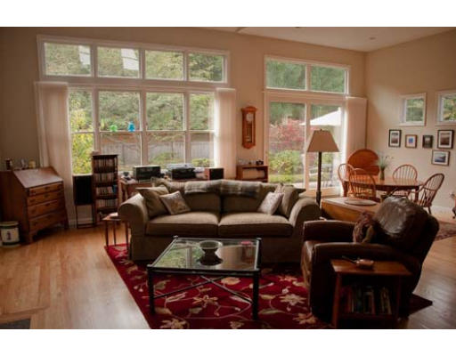 219 Nobscot Road, Unit 219 Sudbury, MA 01776 - Photo 1 of 1 a living room with furniture and a large window