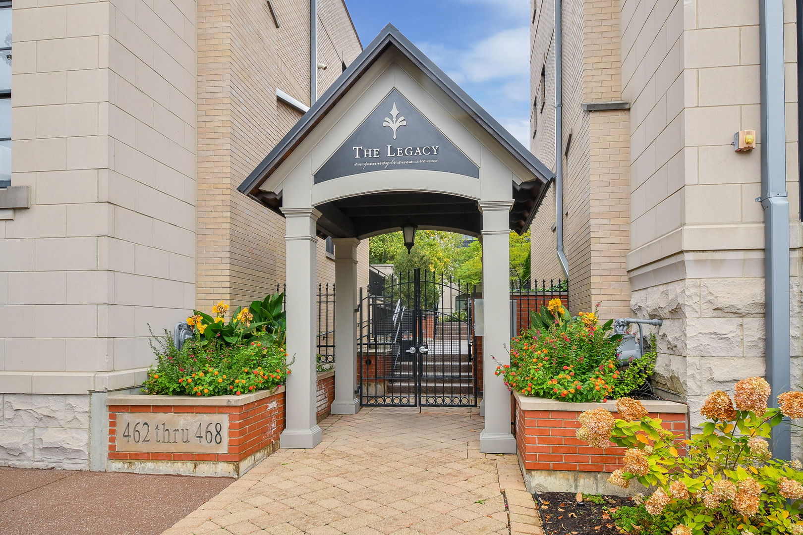 a view of front door and potted plants