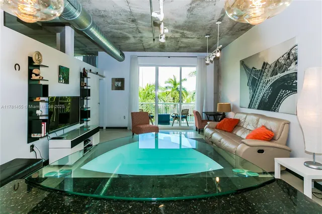 a building outdoor space with patio furniture and potted plants