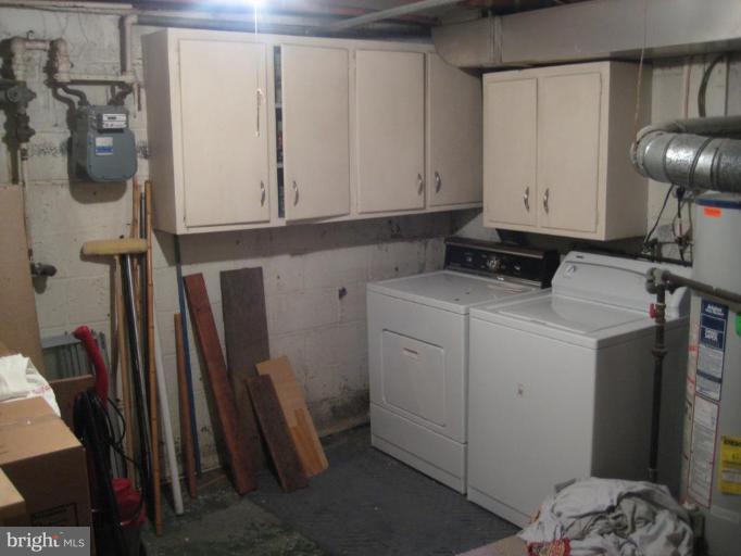 222 Baden Street Silver Spring, MD 20901 - Photo 20 of 21 Lots of cabinets for storage or laundry supplies