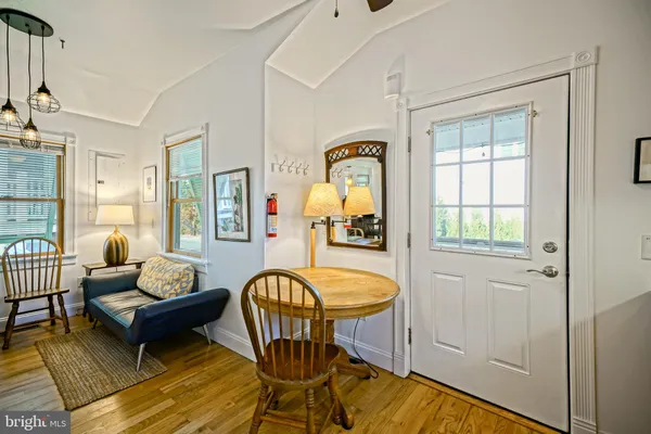 a kitchen with a refrigerator and a sink
