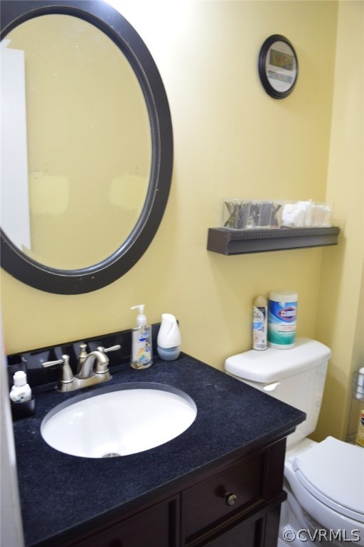 701 Marbleridge Road Chesterfield, VA 23236 - Photo 24 of 28 a bathroom with a sink mirror and toilet