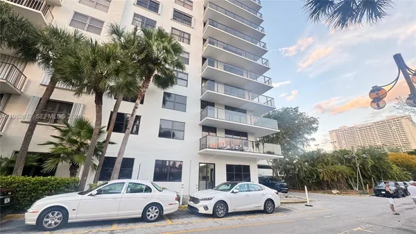 a car parked in front of a building