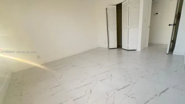 a bathroom with a tub and a sink