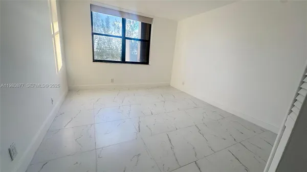 a view of park with large tree