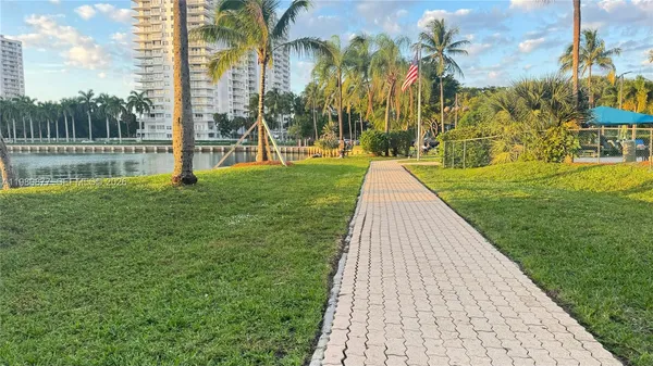 a bathroom with a tub and a sink