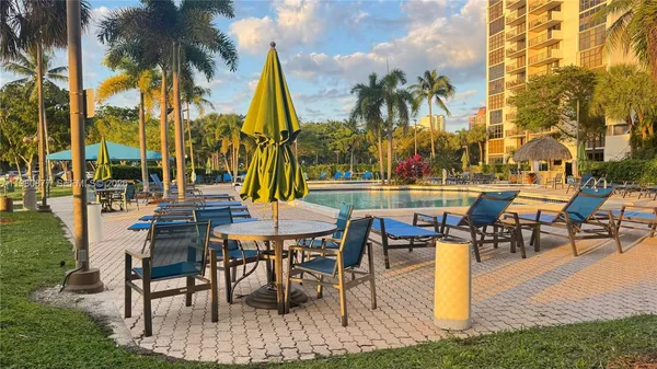 a view of a building with a palm tree