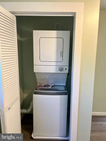 a utility room with washer and dryer