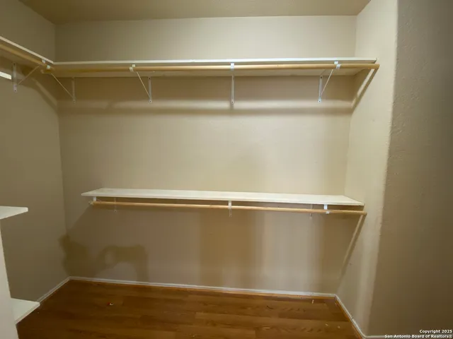 a view of a room with racks on the wall