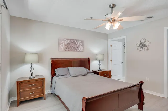 a bathroom with a sink toilet tub and shower