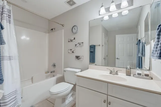 a view of storage and utility room with washer and dryer