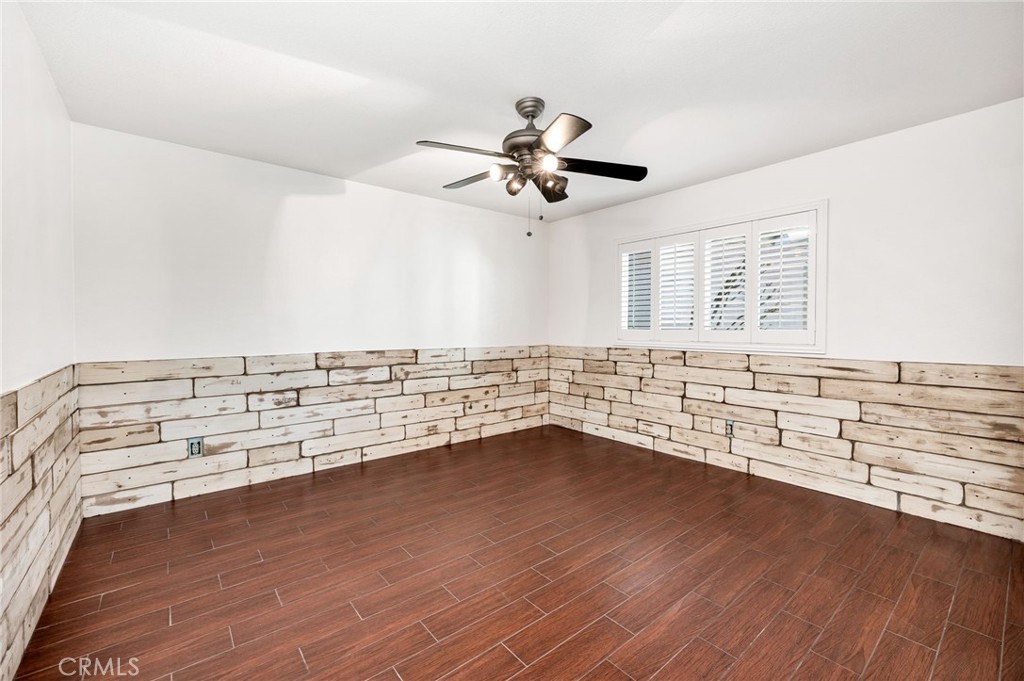 26655 Del Rosa Drive Hemet, CA 92544 - Photo 20 of 57 a view of an empty room with a window and wooden floor