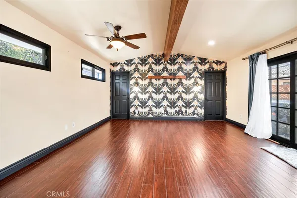 a bathroom with a double vanity sink mirror and shower