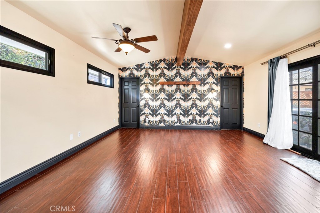 26655 Del Rosa Drive Hemet, CA 92544 - Photo 31 of 57 an empty room with wooden floor and windows