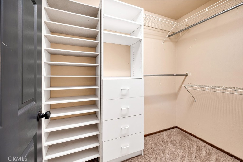 26655 Del Rosa Drive Hemet, CA 92544 - Photo 32 of 57 a view of walk in closet with empty racks