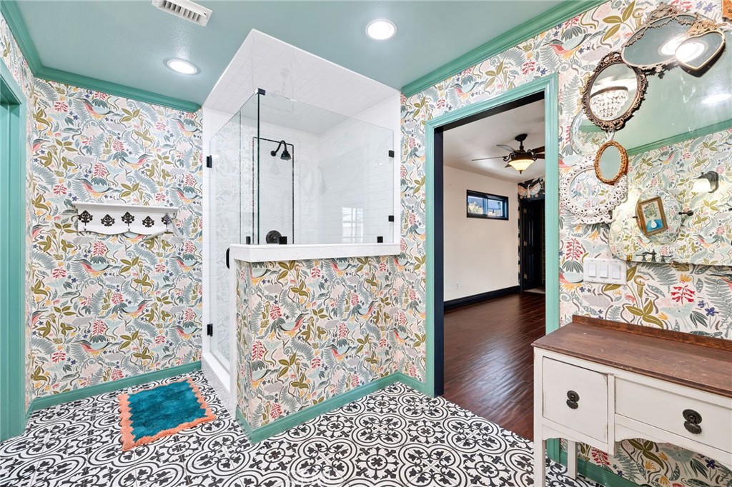 26655 Del Rosa Drive Hemet, CA 92544 - Photo 35 of 57 a bathroom with a sink and a mirror