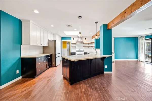 a view of livingroom with furniture and wooden floor