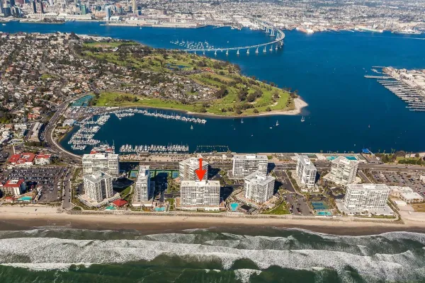 a view of an ocean and a mountain