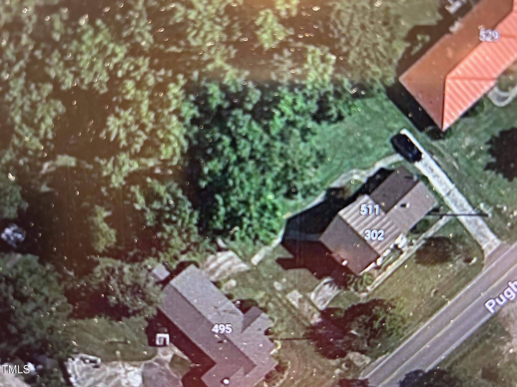 0 Pugh Road Clinton, NC 28328 - Photo 2 of 4 an aerial view of a house with a yard