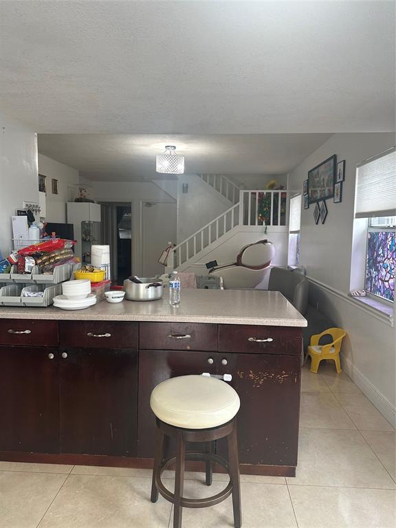 4753 Southwest 154th Court Miami, FL 33185 - Photo 14 of 30 a bathroom with a sink and a mirror