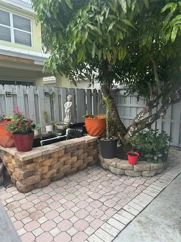 a house view with a outdoor space