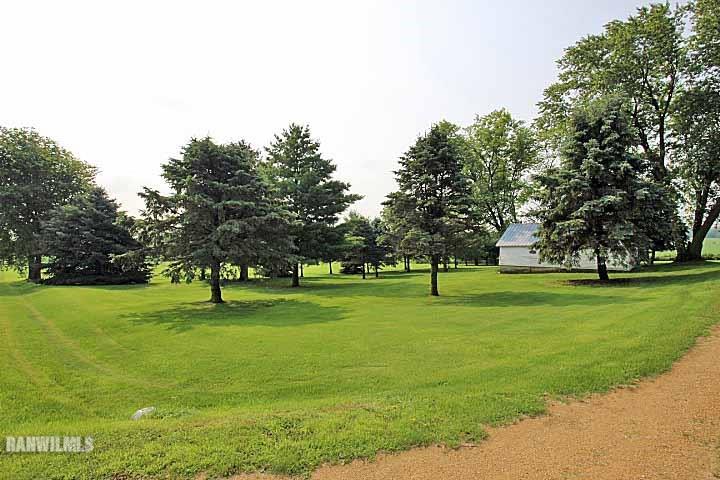 5347 West Richland Road Freeport, IL 61032 - Photo 5 of 20 a grassy field with trees in the background